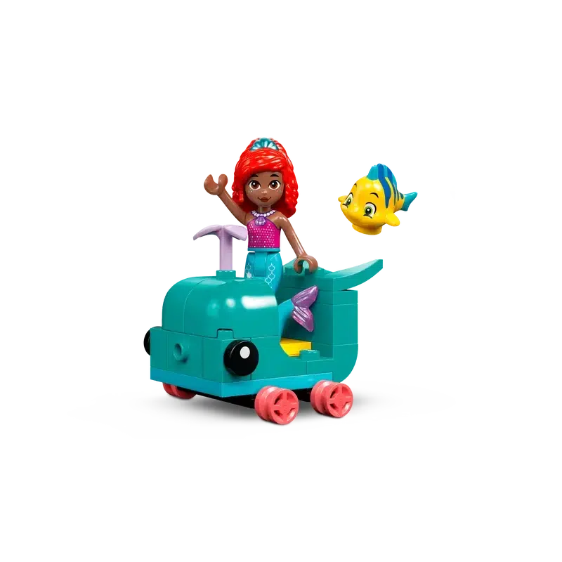 This LEGO building toy features a vibrant character with red hair riding a whimsical teal vehicle shaped like a fish, accompanied by an adorable small yellow and blue fish. Perfect for fans of creative adventures!.