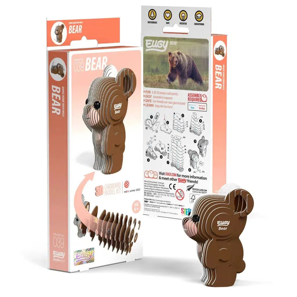 The EUGY flat-packed cardboard bear model kit is an eco-friendly 3D puzzle that includes assembly instructions. The box showcases images of the completed bear and a real bear, perfectly blending creativity with nature-inspired design.