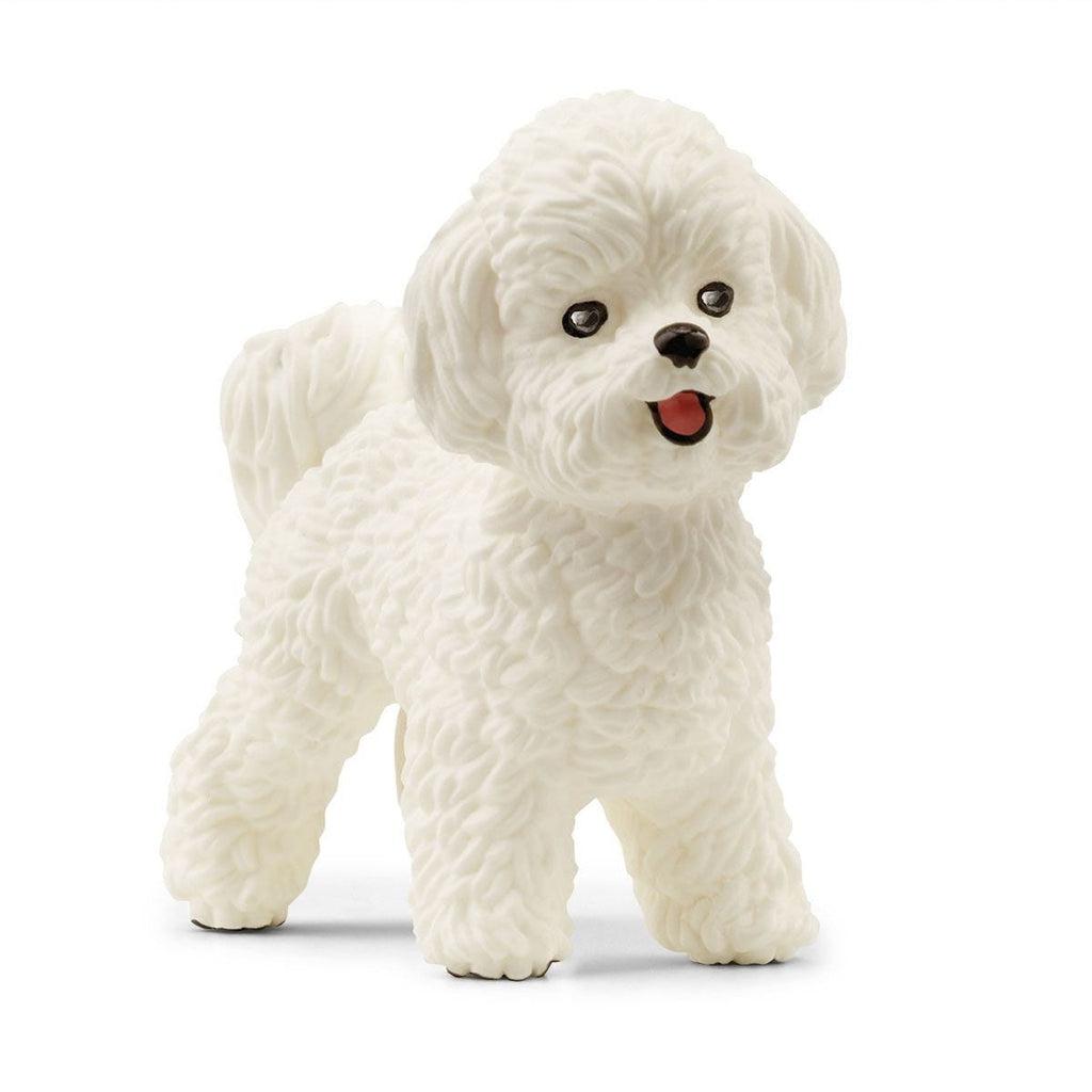 Image of the Bichon Frisé figurine. It is a completely white dog with longish fluffy fur.