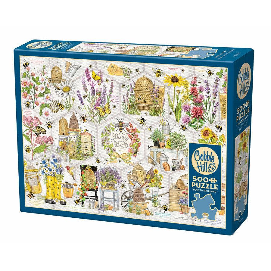 A 500-piece Cobble Hill puzzle featuring illustrations of bees, beehives, and various flowers. The box also indicates that a poster is included.