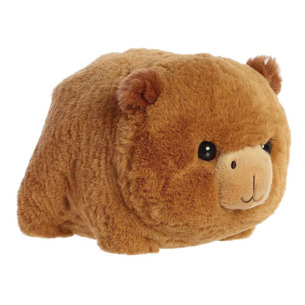 Introducing the Carmen Capybara plush, a snuggly gift that captures the charm of Spudsters. With its light brown fur and small, round ears, this adorable plush toy is perfect for capybara enthusiasts of all ages.