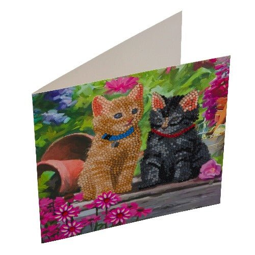 card with image of cats in a garden, the cats are diy crystal art