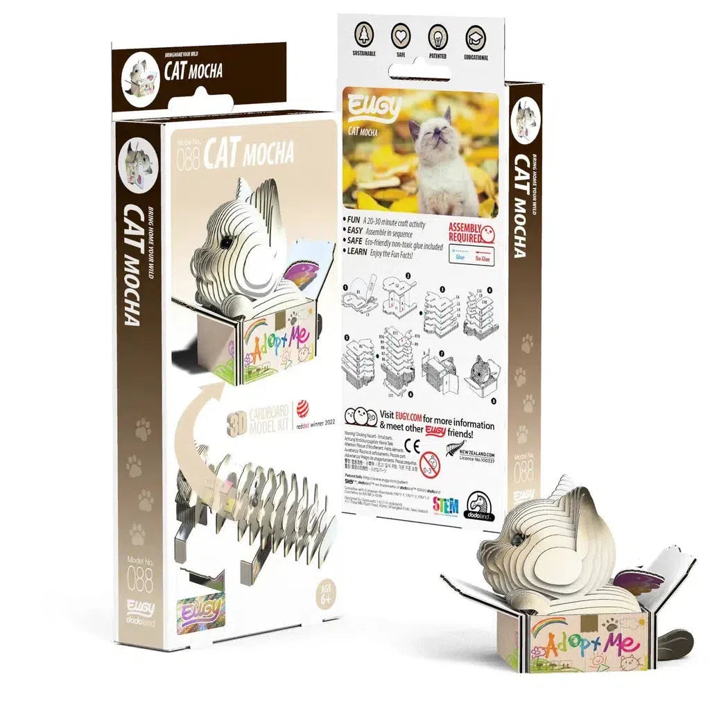 Flat-pack cat model by UGears in eco-friendly packaging, complete with assembly instructions. Includes wood cut-outs for a 3D puzzle cat-shaped model. Box displays a cartoon cat image and text "Adopt Me.