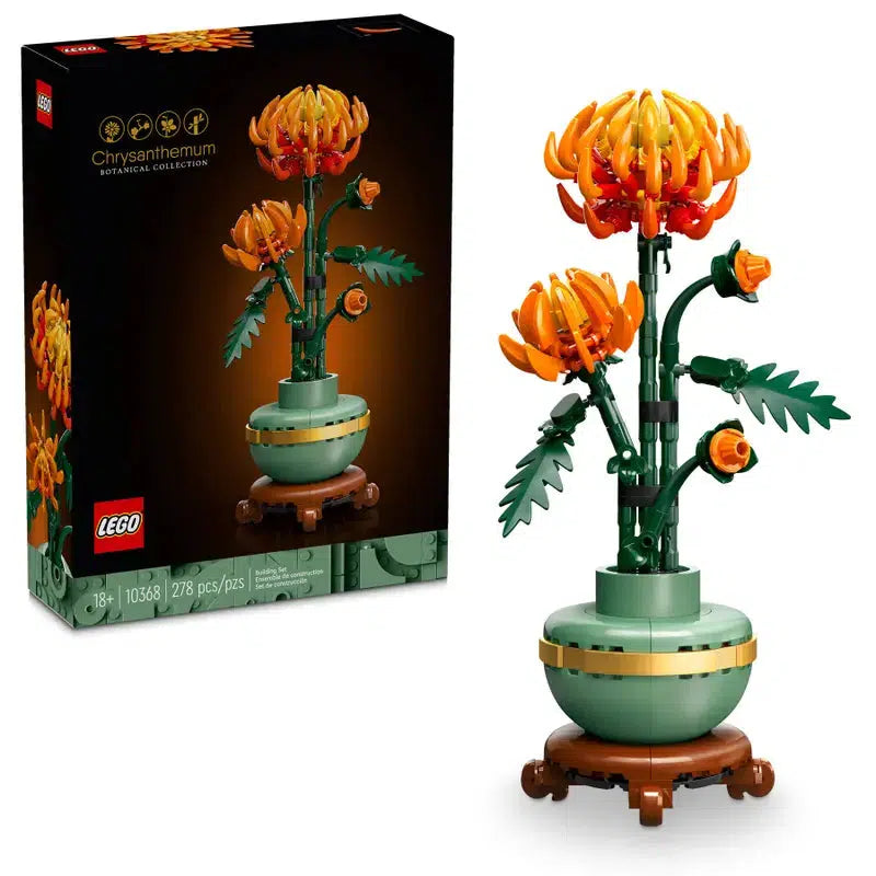 This LEGO building set showcases a chrysanthemum with vibrant orange and yellow petals elegantly arranged in a green vase, perfect for enhancing your home office decor. Displayed next to its box, it combines creativity with charm.