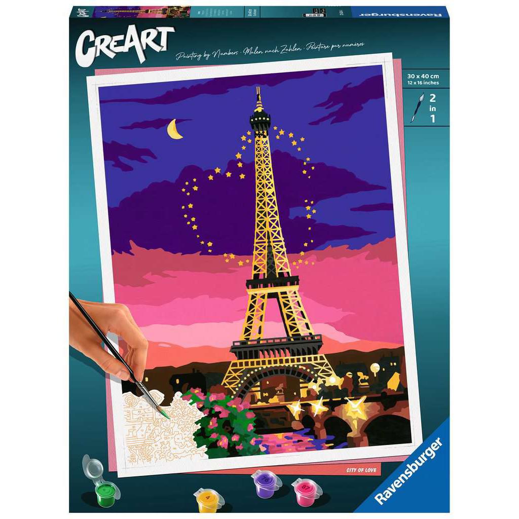 A person paints a colorful image of the Eiffel Tower at sunset, featuring stars and a crescent moon. Art supplies are visible at the bottom.