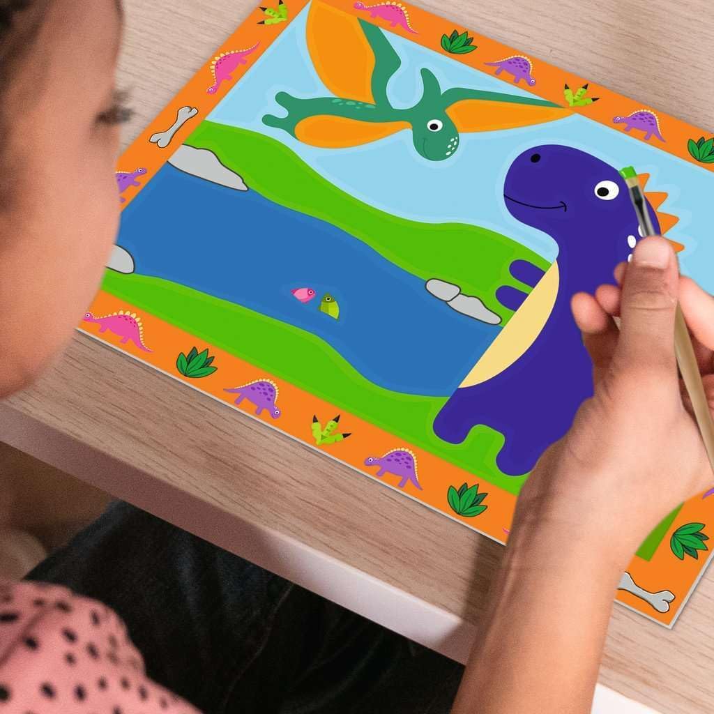 child painting a dinosaur