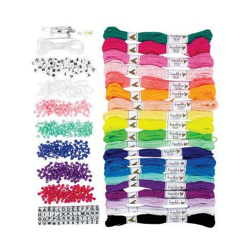 Colorful embroidery floss and beads are arranged on a white surface. Includes alphabet beads, round beads in various colors, and multiple skeins of thread in vibrant shades.