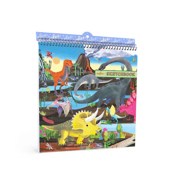 Colorful dinosaur-themed sketchbook cover with sustainably sourced materials, featuring various prehistoric scenes, including a volcano, trees, and diverse dinosaurs in a vibrant landscape.