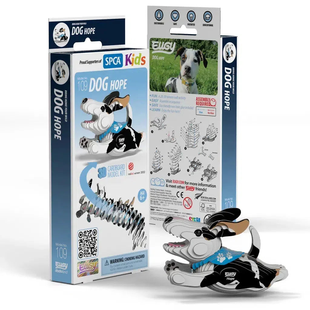 Cardboard model kit of a dog named "Hope" displayed with eco-friendly packaging. The box features a cartoon dog image and highlights assembly instructions, offering a fun 3D puzzle experience infused with STEM concepts.