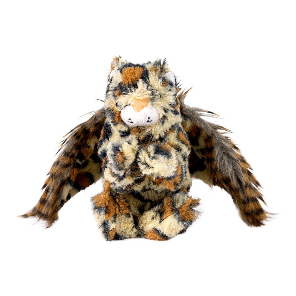 A Randimal plush sits upright against a black background, its tiger-like fur complemented by whimsical wings. This imaginative animal character invites you to explore a world where fantasy and reality intertwine.