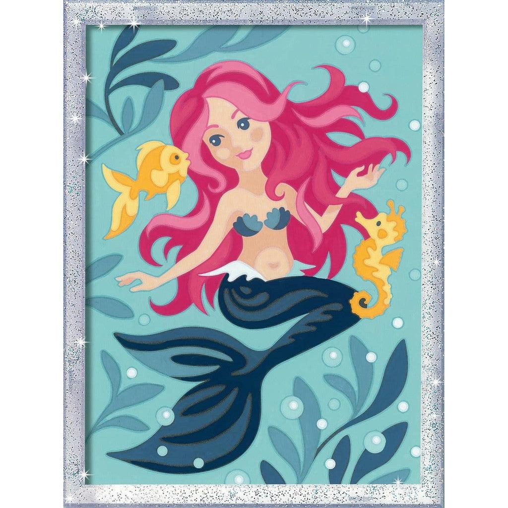 Illustration of a mermaid with pink hair, accompanied by a goldfish and seahorse, surrounded by aquatic plants and bubbles, reminiscent of the Ravensburger Enchanting Mermaid Paint by Numbers Kit.