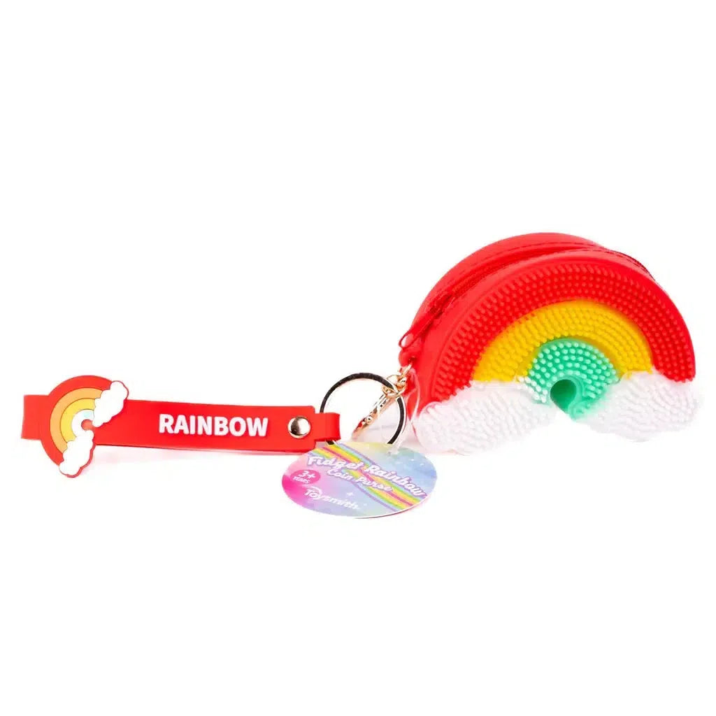 A colorful display box features Fidget Rainbow Coin Purses, each with a textured surface and vibrant rainbow designs. The packaging mirrors a delightful rainbow and cloud theme, while some purses include a keychain for easy attachment to bags, perfect for both style and functionality.