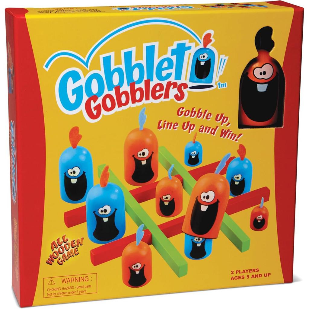 The board game box, titled "Gobblet Gobblers," features colorful cartoon figures on a tic-tac-toe grid. This delightful strategy board game by Blue Orange Games is perfect for ages 5 and up.