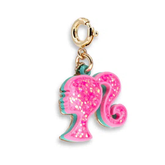 barbie head charm that is pink and glittery with blue outline