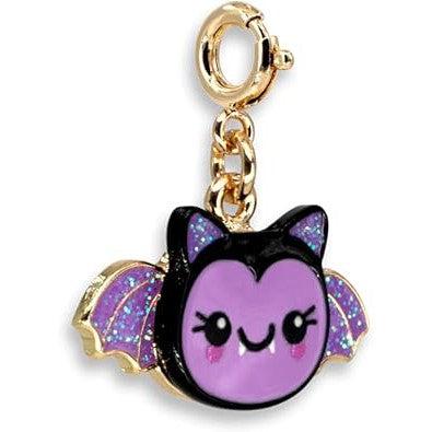 side of purple glittery bat charm with cute face