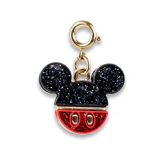 charm shaped like mickey mouse icon with black ears and red bottom and glittery