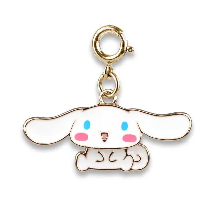 A gold swivel Cinnamaroll charm showcasing a white cartoon character with large ears, blue eyes, and a pink blush. Perfect for any CHARM IT! bracelet or as an addition to your Hello Kitty Friends collection.