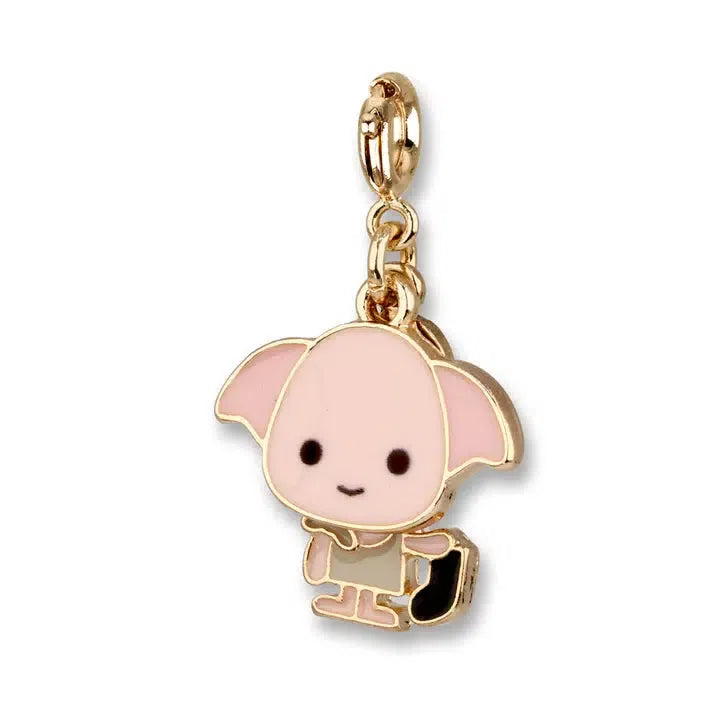 A gold-colored Dobby charm from the Wizarding World, depicting the beloved elf with large ears and a small outfit, holding an object.