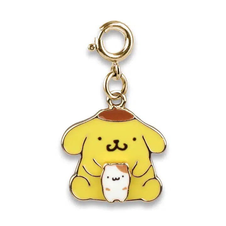 A gold-colored CHARM IT! charm features Pompompurin, the beloved yellow cartoon dog, holding a small white creature. The playful pup has floppy ears and a brown spot on its head. Completing the design is a circular clasp at the top.