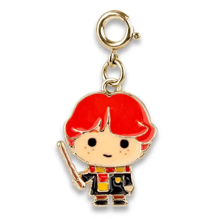 Chibi-style keychain of a red-haired character in a black robe holding a wand, featuring a Gryffindor scarf for an enchanting touch.