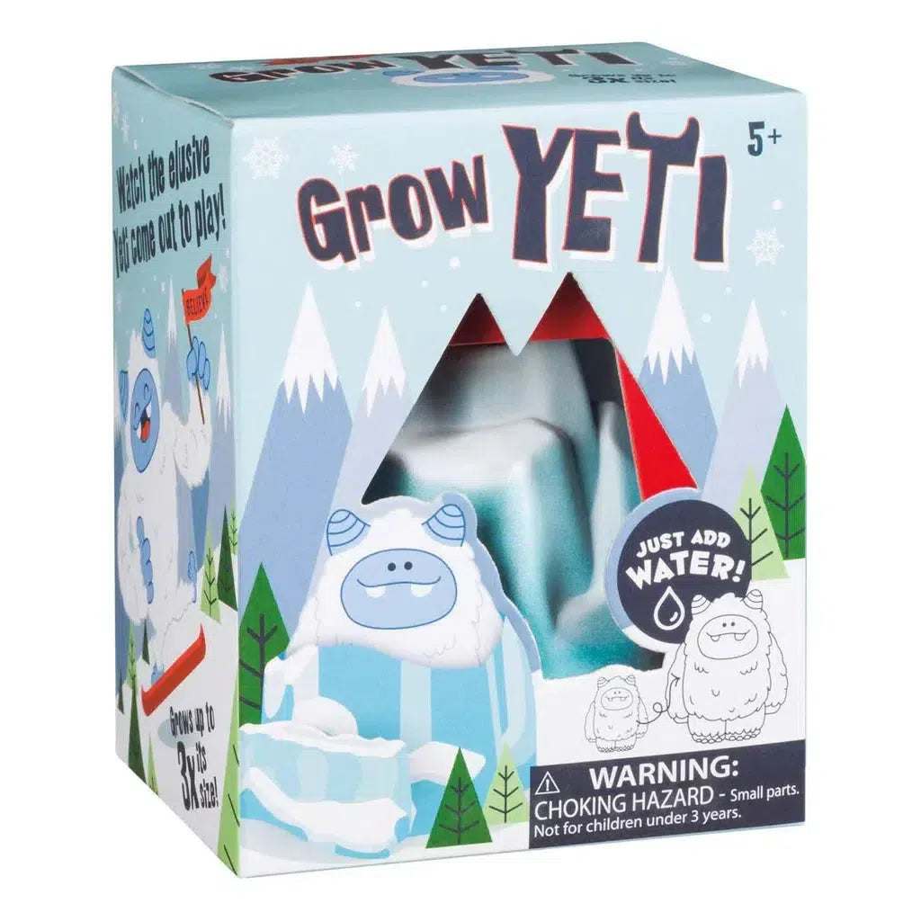 Display of "Hatchin’ Grow Yeti" toy boxes with blue yeti illustrations and mountains on the packaging. This DIY grow toy is suitable for ages 5 and up.