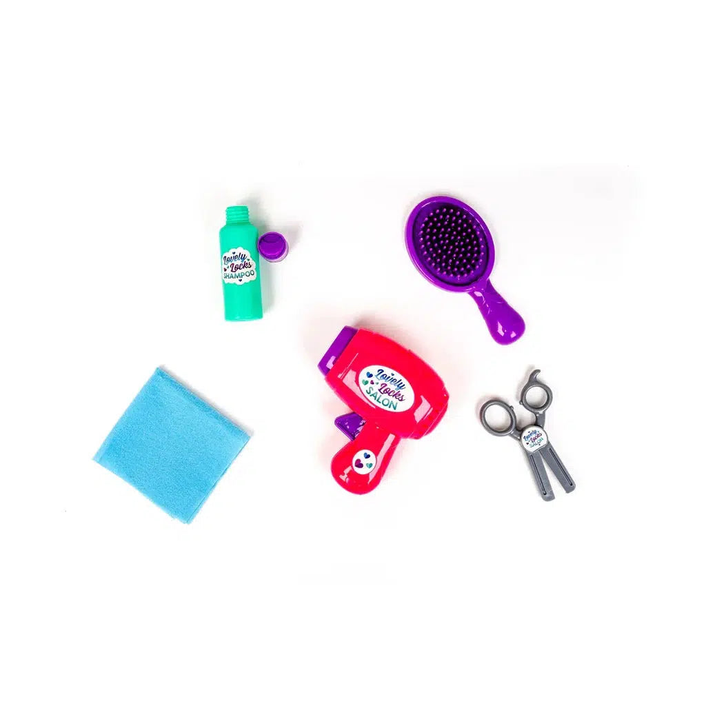 Hairdresser Set: This toy hair styling set features a red hairdryer, purple brush, green shampoo bottle, blue cloth, and silver scissors. Perfect for imaginative use and pretend play, it's beautifully arranged on a white background.