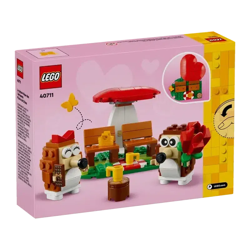 The back of the box shows the lego set with the hedgehogs out of the chairs in front of the rest of the set.