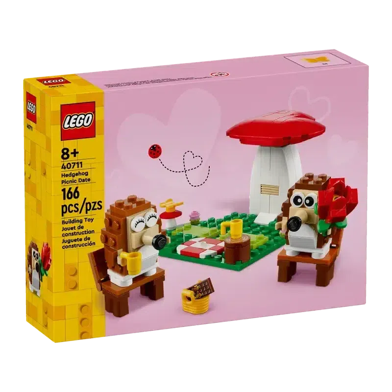 Front of the box shows the  lego set finished. There are two hedgehog figures next to a picnic set and a mushroom with a heart shaped top