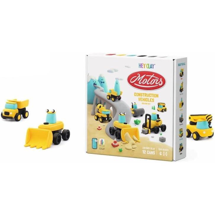 Box of Hey Clay Construction Vehicles set with yellow and blue toy vehicles made from clay, perfect for budding builders. This Arts &amp; Crafts kit includes a charming bulldozer and dump truck, combining creativity and play in Toys &amp; Games.