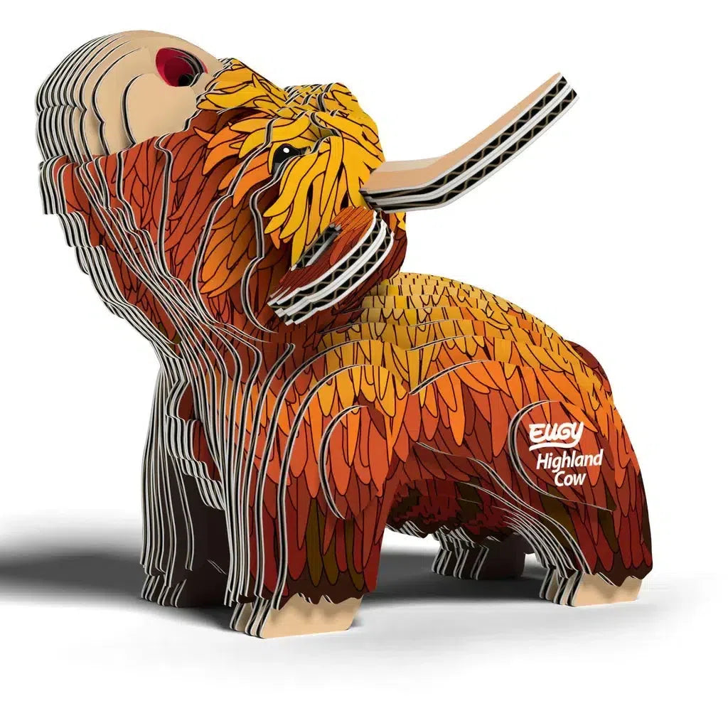 This eco-friendly 3D puzzle sculpture of a Highland Cow is crafted from layered, colorful pieces. It features an extended nose, ears, and fur-like textures. The base reads "Highland Cow," embodying both creativity and STEM concepts in its intricate design.