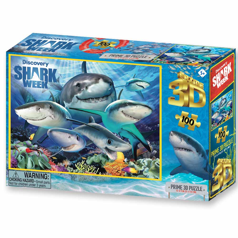 Dive into the excitement with this 100-piece 3D jigsaw puzzle showcasing a group of sharks swimming underwater. The box proudly sports the "Discovery Shark Week" label and includes a warning about small parts. Perfect for any shark enthusiast!