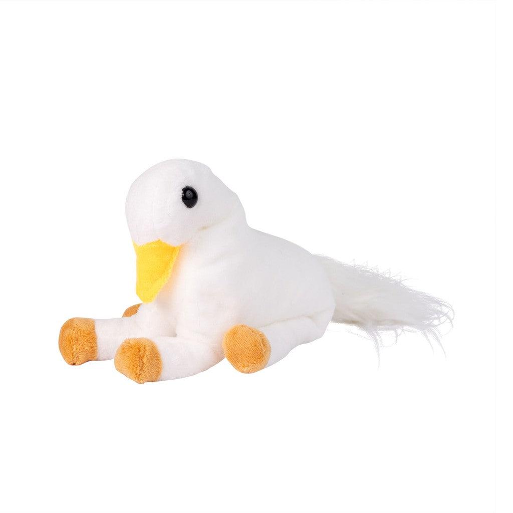 The white plush bird toy, styled as one of the whimsical Randimal characters, features an eye-catching orange beak and feet set against a striking black background.