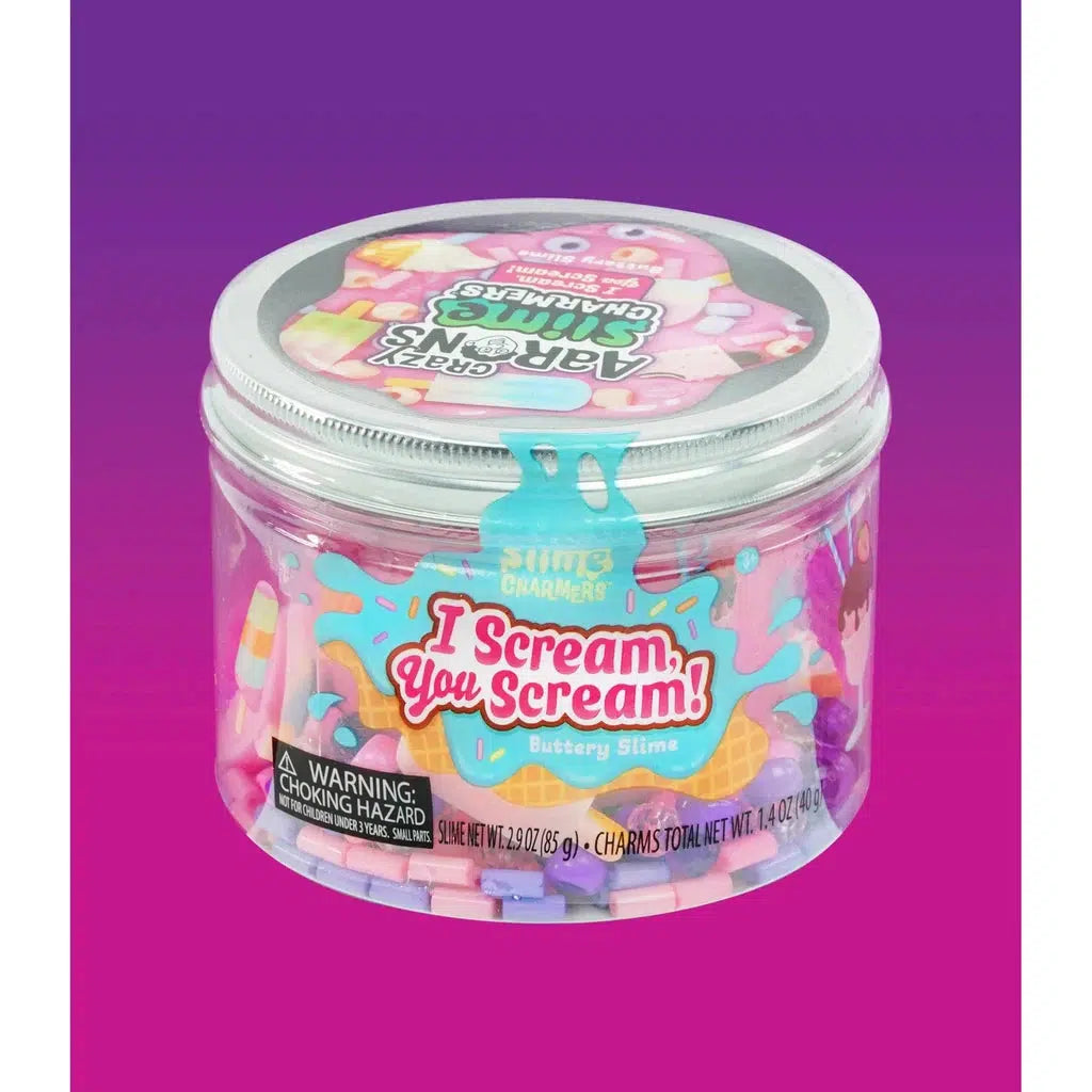 A jar of Crazy Aaron's Slime labeled "I Scream, You Scream!" features butterslime against a purple-pink gradient background. The container includes delightful ice cream cone charms and carries a choking hazard warning.