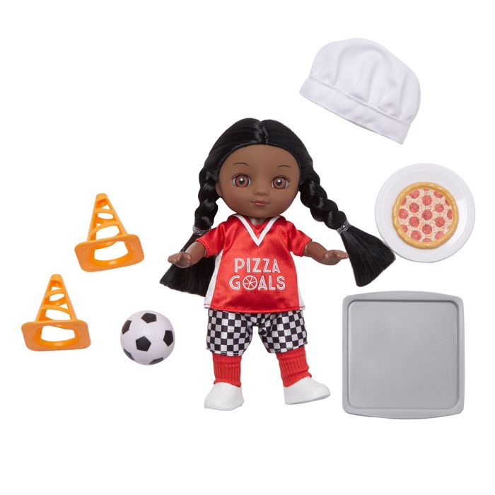 A chef doll wearing a "Pizza Goals" jersey stands ready for action with a toy soccer ball, two traffic cones, a pizza, a chef's hat, and a tray. This delightful children's toy inspires both athletic pursuits and culinary dreams.