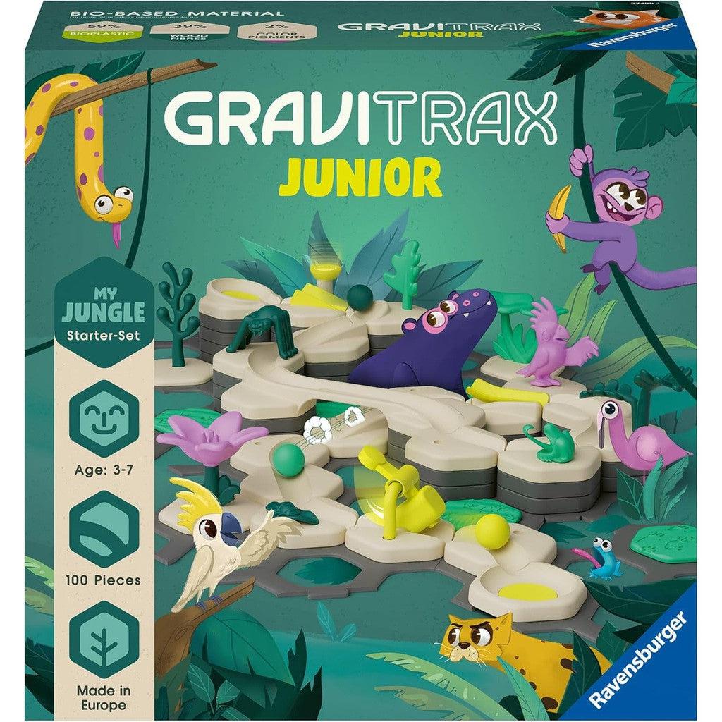 Gravitrax Junior green box with cartoon animals among the wood-themed marble run pieces