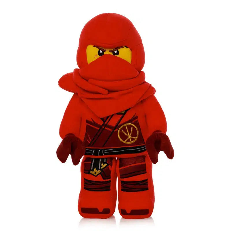 This Kai plush toy, inspired by LEGO NINJAGO, features a red ninja outfit complete with hood, mask, and intricate black and gold detailing. It's perfect for both play and display.