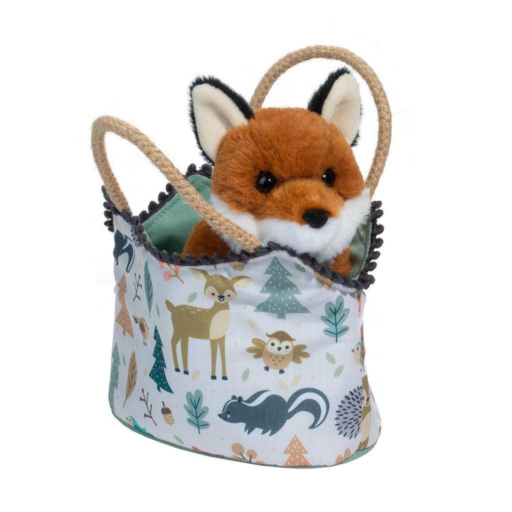 A plush Red Fox snuggles in a decorative fabric basket, part of the Magical Forest Sassy Pet Sak collection, adorned with enchanting woodland animals and trees.