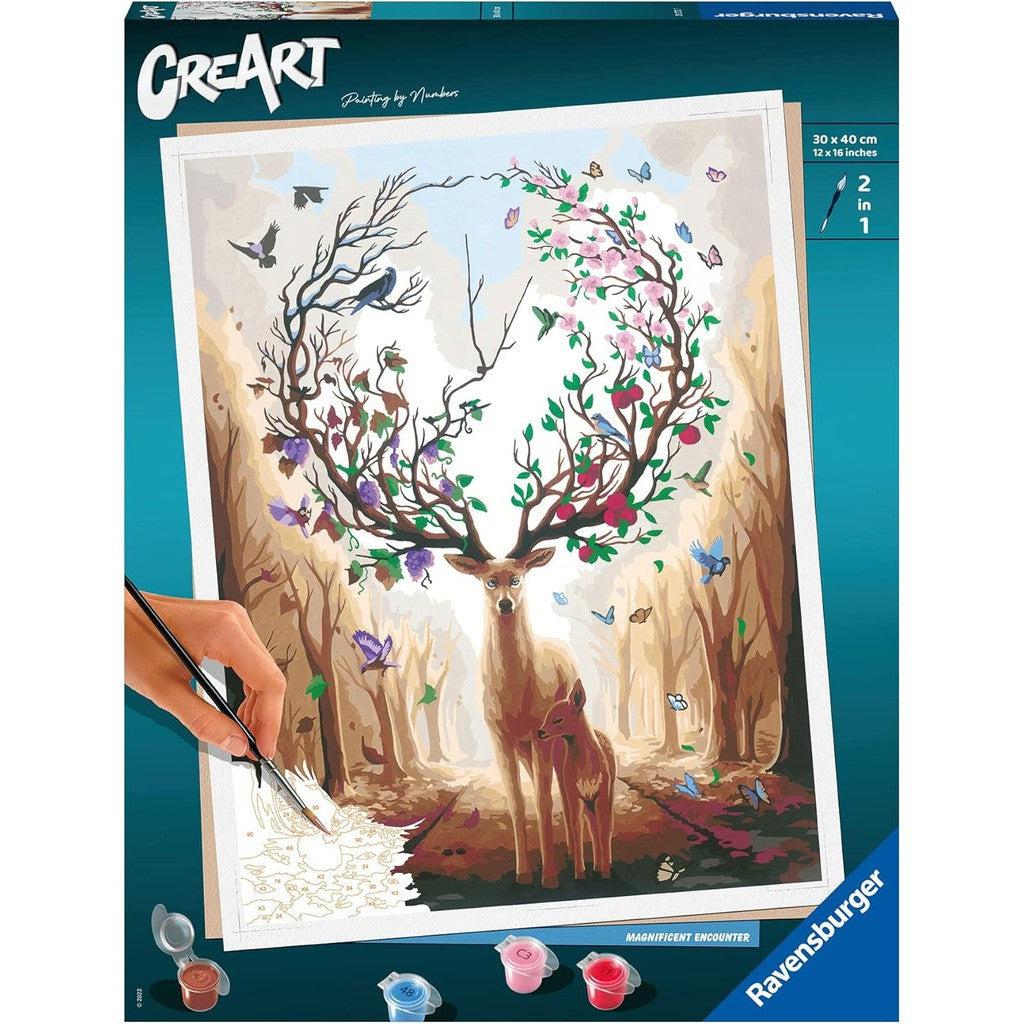 Experience the magic of a Ravensburger paint-by-numbers kit featuring a deer with tree-like antlers in a vibrant forest, adorned with curious birds and fluttering butterflies. The scene comes to life under your brush's touch, blending the joy of painting with arts and crafts creativity.