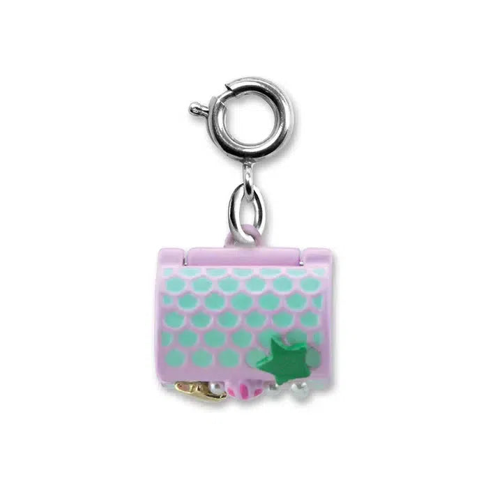 A small sunken treasure charm with a circular clasp, featuring a pastel pink and green design resembling fish scales, perfect for any mermaid lover. A delicate green star decorates the front, making it an enchanting addition to your charm bracelet.