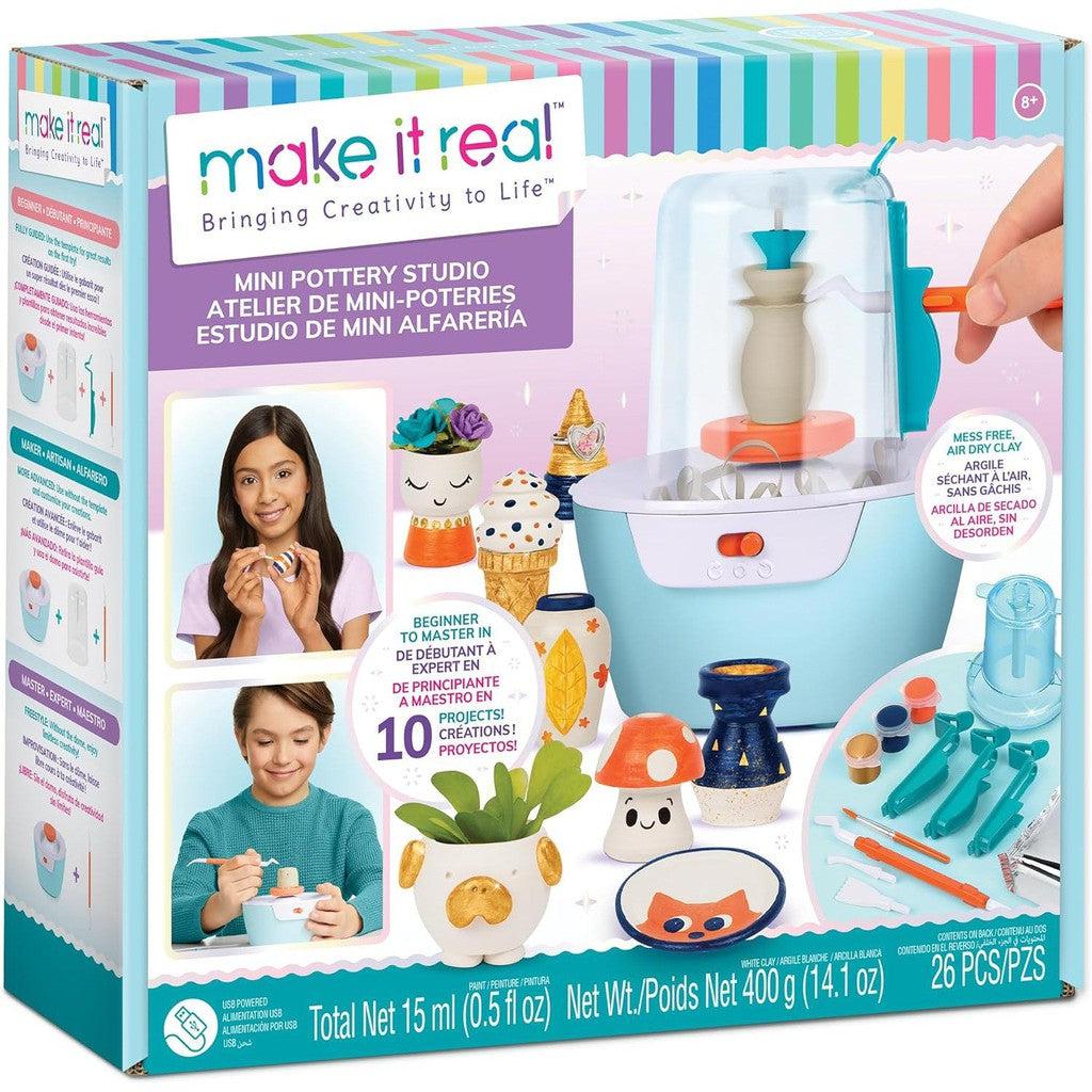 The "Make It Real" DIY Pottery Kit box features a Mini Pottery Studio with pottery tools and air-dry clay, showcasing 10 exciting projects. Ideal for two children, it includes a total of 26 pieces to inspire creativity.