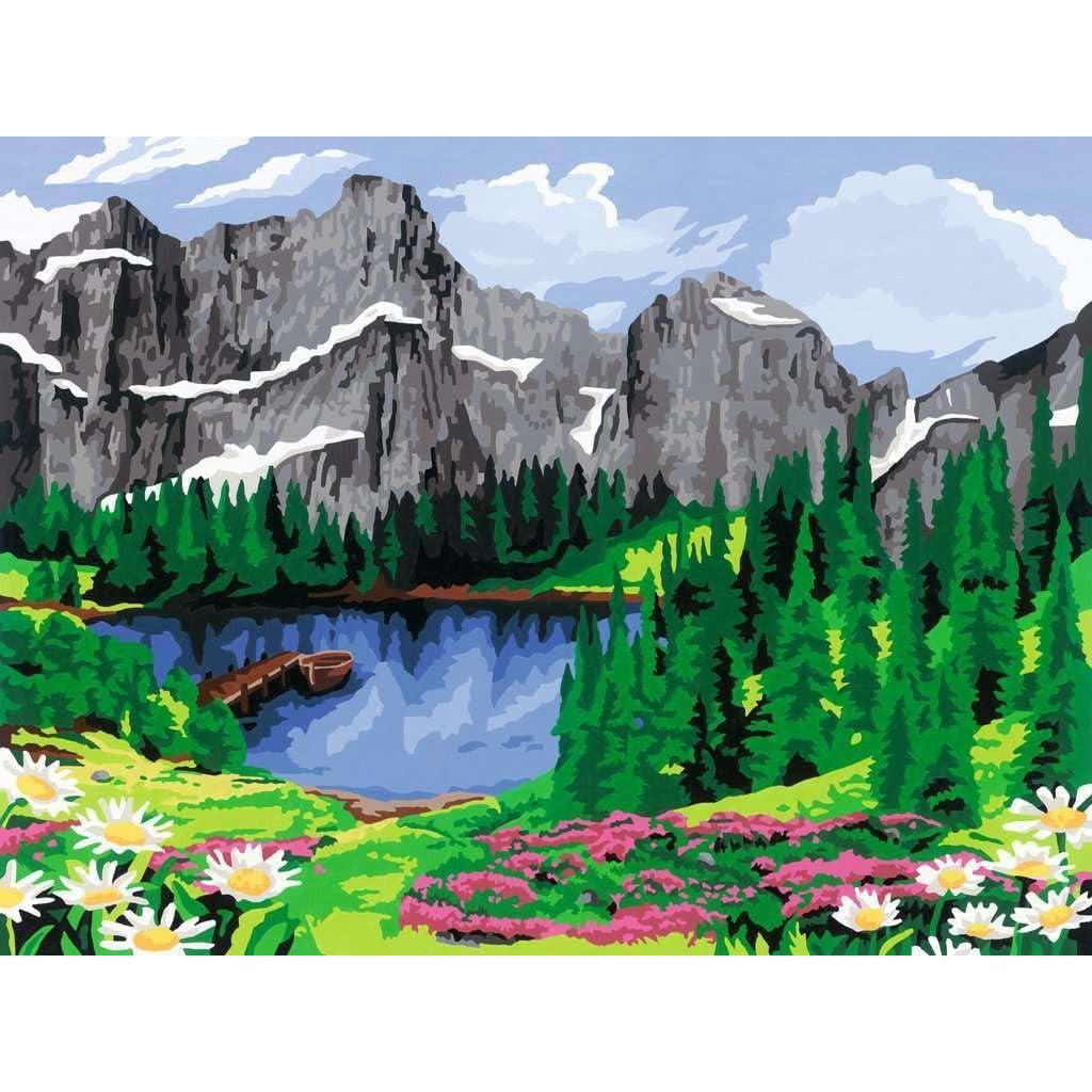 A vibrant Ravensburger CreArt painting of a mountain landscape with a serene lake, pine trees, daisies, and pink flowers in the foreground. Snow-dusted peaks rise under a partly cloudy sky, capturing the essence of nature's beauty through Painting Arts and Crafts.