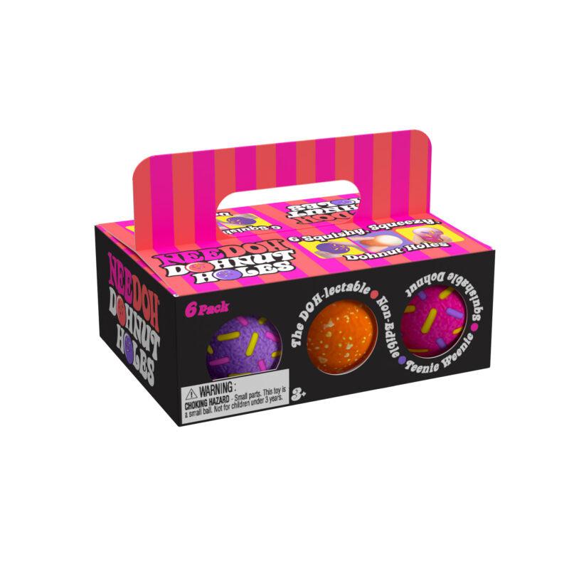 A vibrant box of "Neighbour Donut Holes" features playful pink and orange graphics, offering a delightful sensory experience with a pack of six Dohnut Holes.