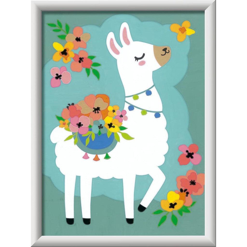 This charming illustration features a white llama adorned with colorful tassels and carrying a basket of vibrant flowers. Surrounded by more blossoms and a fluttering butterfly, this scene is reminiscent of Ravensburger CreArt's Arts and Crafts collection, set against a teal background.