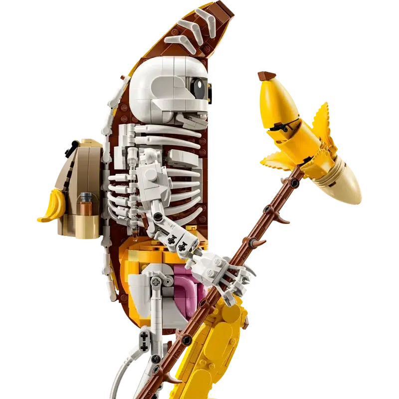 a side view of the set showing the backpack on it's back and the banana pickaxe in hand.