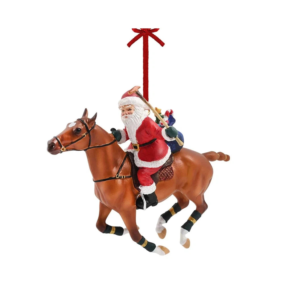 the polo playing santaf is santa riding a horse for a Christmas ornament.
