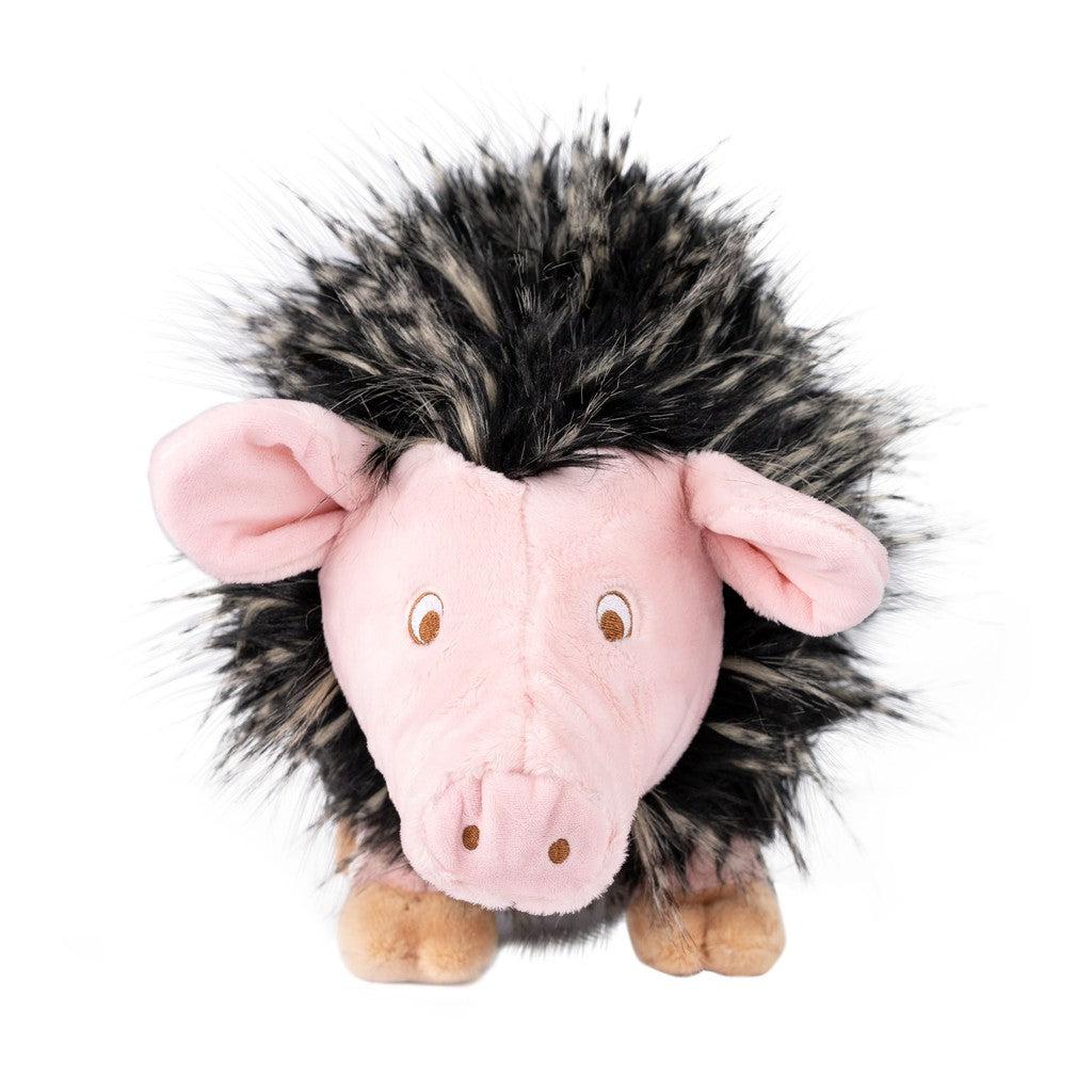 Meet Randimal, the plush hedgehog toy featuring a pink snout, ears, and feet. Its black-and-white spiky fur on the back adds to its charm. Soft and huggable, this delightful animal character is perfect for cuddles.