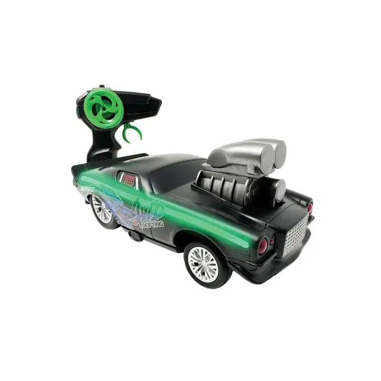 A green and black toy car with a large rear engine and decorative stickers, shown from a back angle.