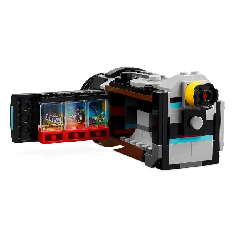 The camcorder build is shown with the side "viewing window" open and one of the lego film reels slides showing on it.