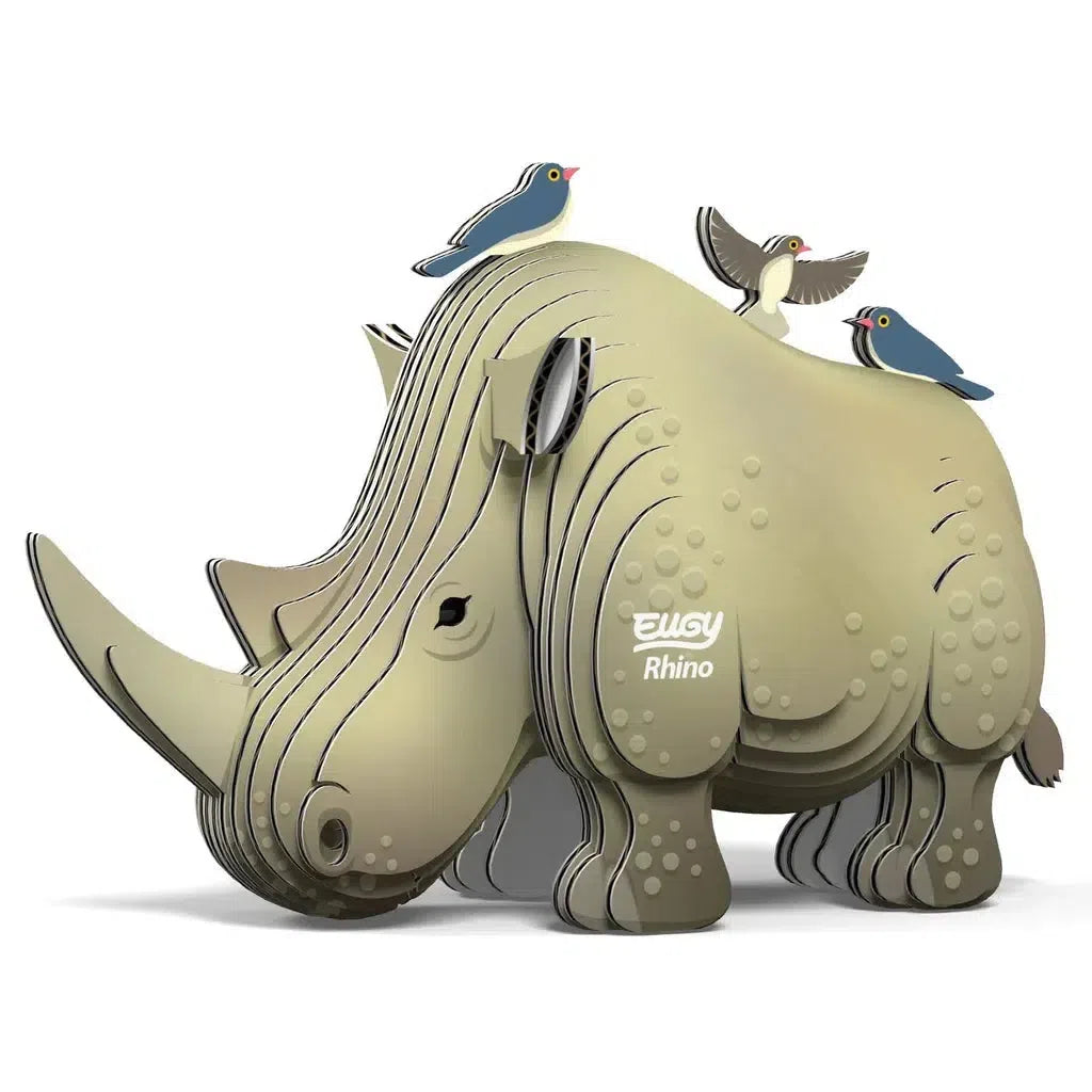 A stylized, eco-friendly 3D rhino model with layered textures features three small birds perched on its back. The rhino and birds boast a simplified, cartoonish appearance, resembling a delightful 3D puzzle that captivates both the young and the young-at-heart.