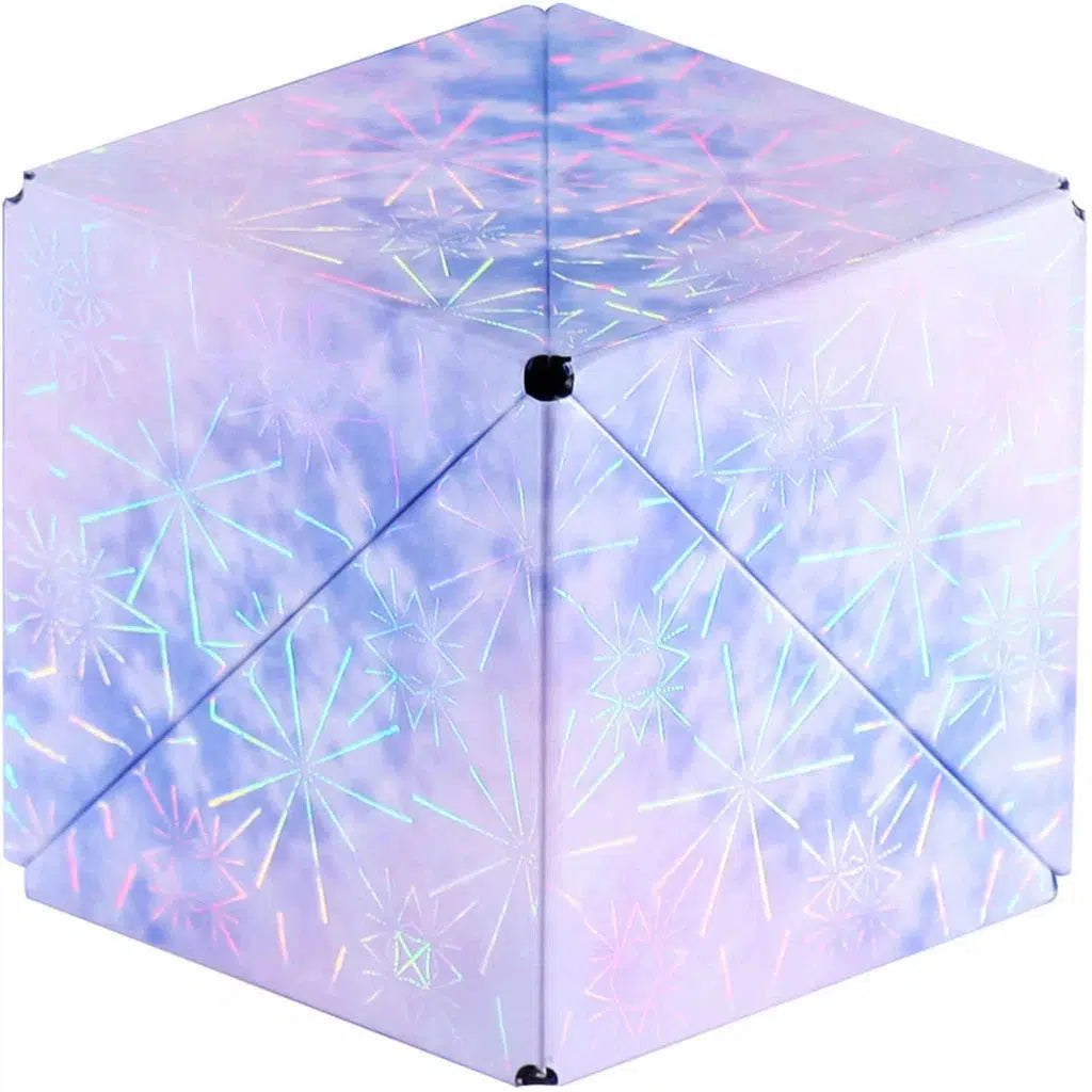 Hexagonal box with holographic snowflake pattern on the surface.